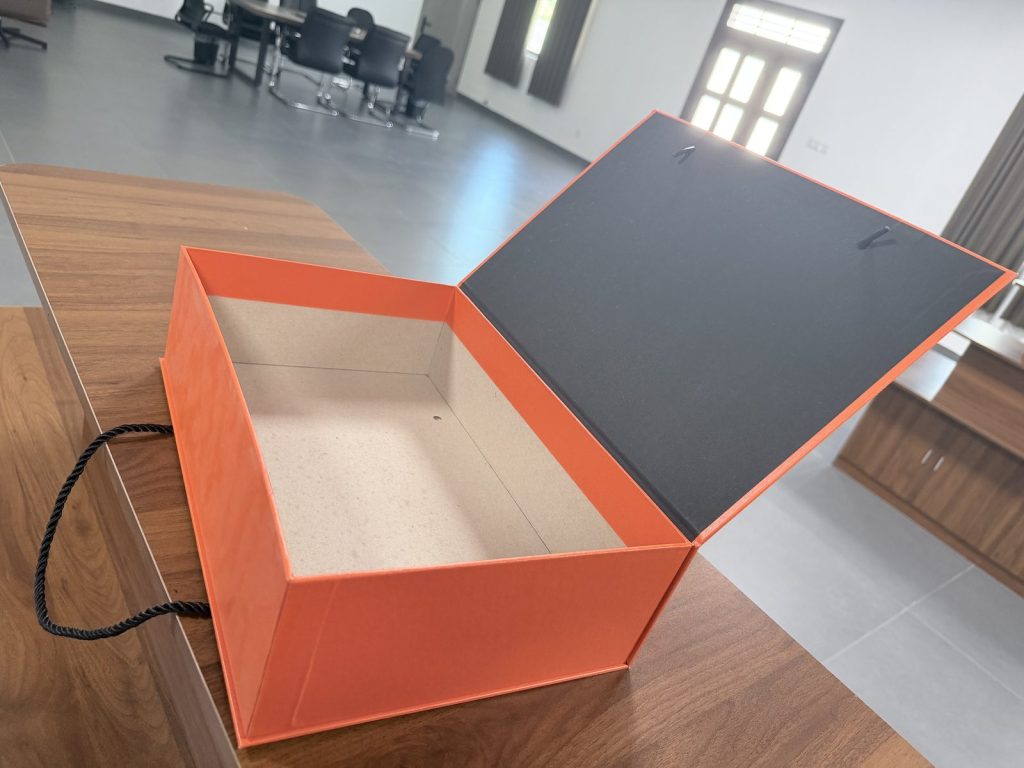 Bright Orange Rigid Gift Box With Black Rope Handles Premium Packaging - view