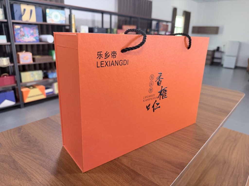 Bright Orange Rigid Gift Box With Black Rope Handles Premium Packaging