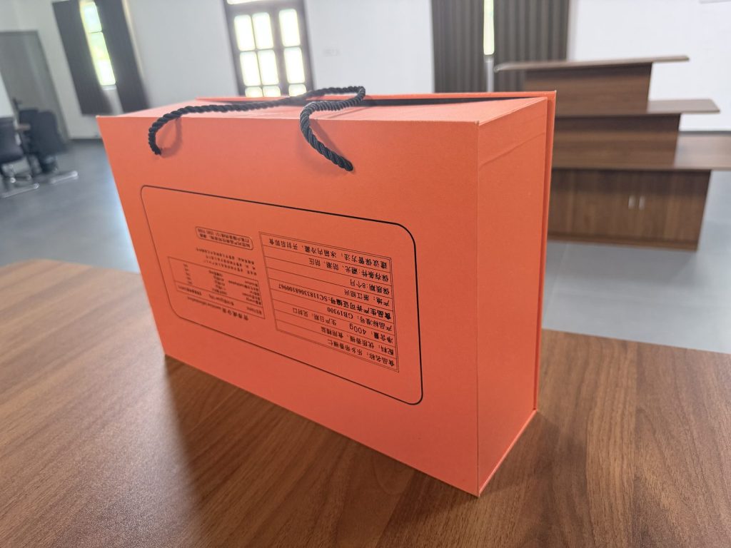 Bright Orange Rigid Gift Box With Black Rope Handles Premium Packaging - view