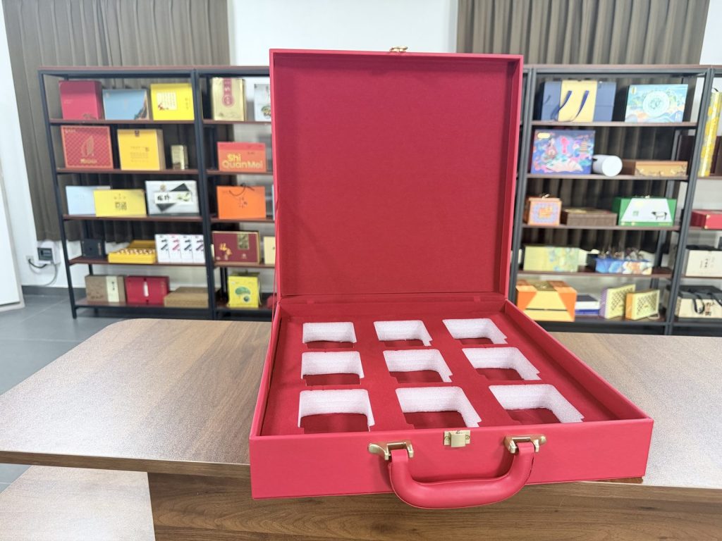 Maroon Twelve Slot Jewelry Gift Box Set With Gold Logo And Handle - view